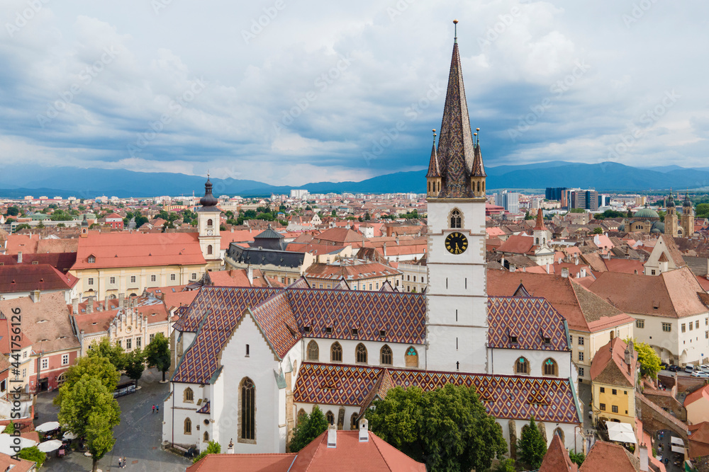 Aerial view of ancient part of Sibiu in Romania, red roofs town in summer day
