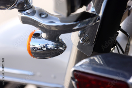 Close up shot reflection of Motor Cycle Road Trip background Street . Big Bikes with Copy Space. Design Retro Style Selective Focus. photo