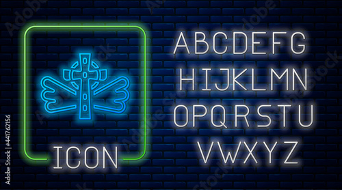 Glowing neon Christian cross icon isolated on brick wall background. Church cross. Neon light alphabet. Vector