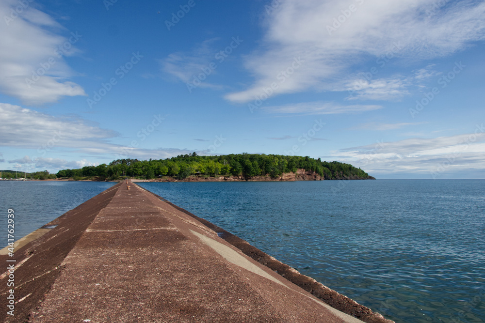 View of an island from on top of a seawall