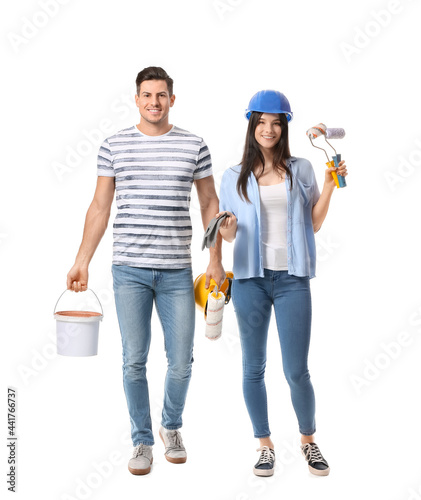 Young couple with rollers, ...