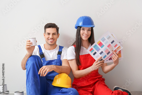 Young couple with can of pa...