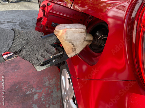 Fuel Nozzle Gun at Gas Station