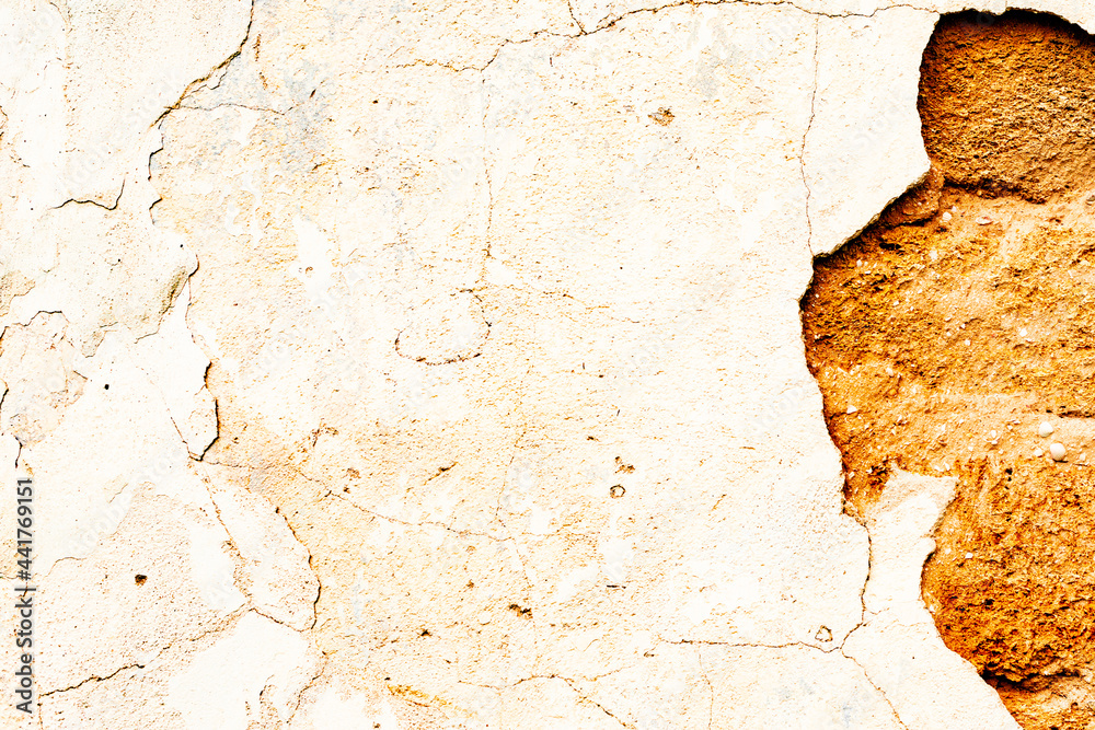 Obraz premium Texture of a concrete wall with cracks and scratches which can be used as a background