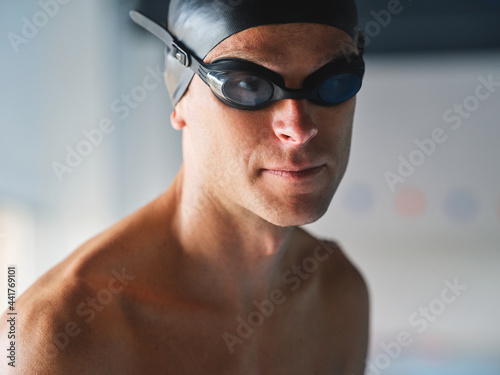 Determined sportsman in goggles during workout
