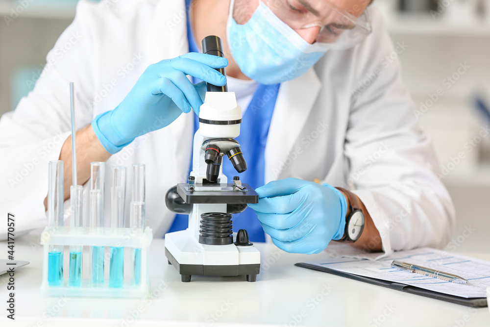 Male scientist working in laboratory Male scientist working in laboratory