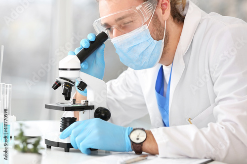 Male scientist working in l...