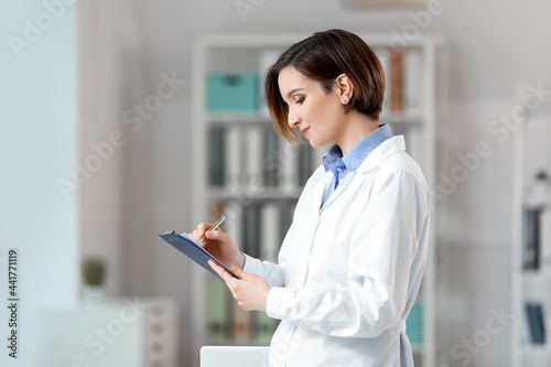 Female doctor working in cl...