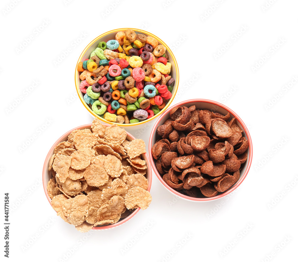 Bowls of different cereals on white background Bowls of different cereals on white background