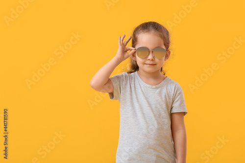 Cute little girl wearing su...