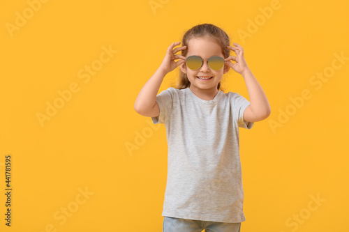 Cute little girl wearing su...