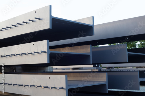 Bild auf Leinwand construction site beams stack h-beam metal structure