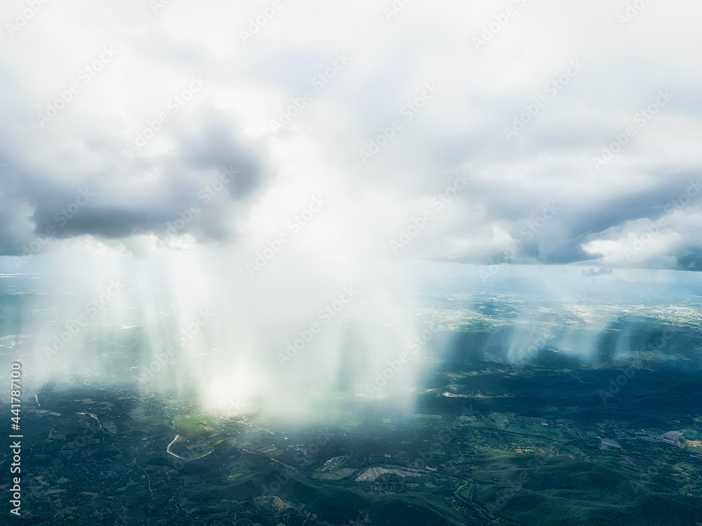 Aerial view of shower rain falling to earth surface , calm and meditaion concept