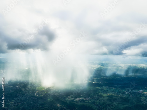 Aerial view of shower rain falling to earth surface , calm and meditaion concept