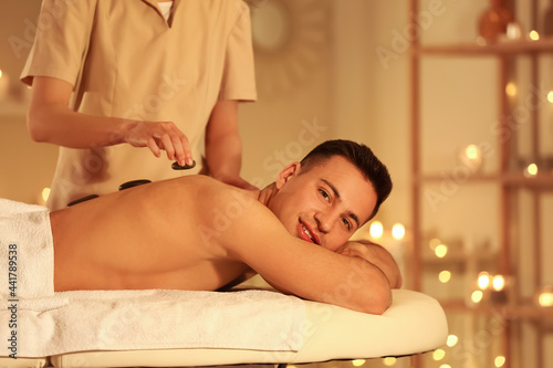 Relaxed young man receiving...
