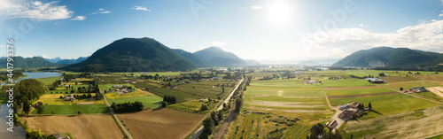 Aerial Panoramic View of Scenic Road in Fraser Valley during a sunny summer morning. Located near Mission, British Columbia, Canada.