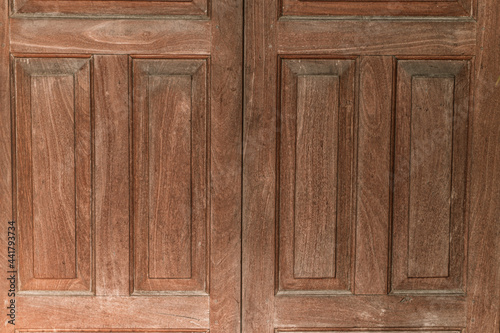 Drewniane brązowe tło, tekstura deski.