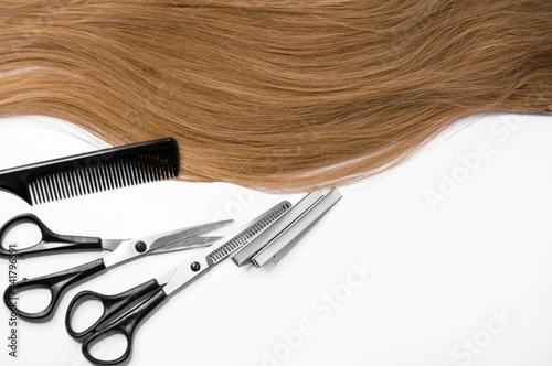 Hair and hairdresser items scissors, comb, clipper on a white background