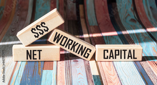 Wallpaper Mural Net Working Capital text on wooden blocks. Torontodigital.ca