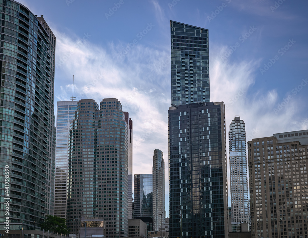 Cluster of new skyscrapers in Downtown Toronto on a blue and cloudy sky background Cluster of new skyscrapers in Downtown Toronto on a blue and cloudy sky background