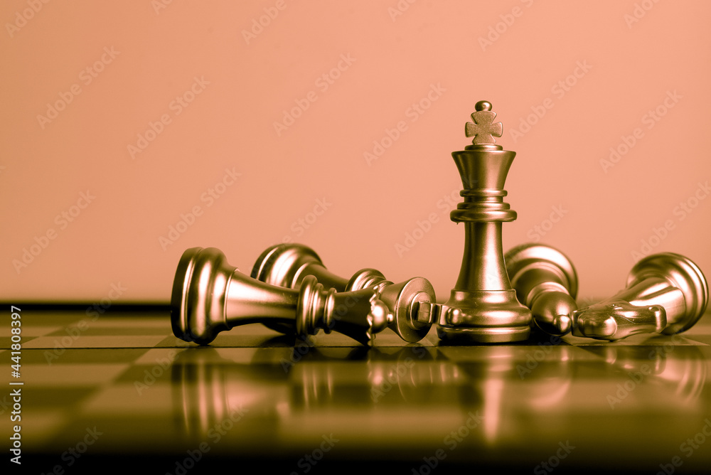 Chess board game to represent the business strategy with competition in the world market. and find out the best solution to meet target objective and goal. Sign and symbol of challenging as concept. Chess board game to represent the business strategy with competition in the world market. and find out the best solution to meet target objective and goal. Sign and symbol of challenging as concept.