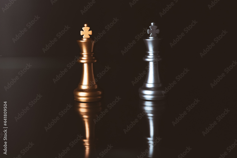 Chess board game to represent the business strategy with competition in the world market. and find out the best solution to meet target objective and goal. Sign and symbol of challenging as concept. Chess board game to represent the business strategy with competition in the world market. and find out the best solution to meet target objective and goal. Sign and symbol of challenging as concept.