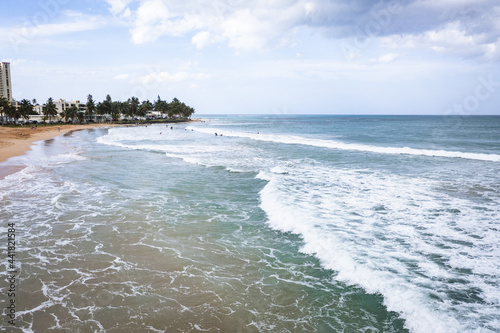 Surfers in Water from Drone photo