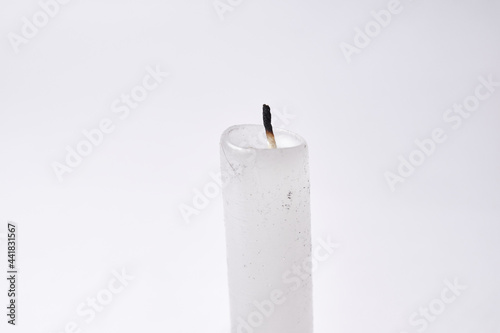 Blown out candle isolated on white background