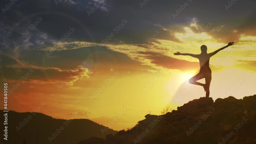 Woman practicing yoga on hillside at sunset, concept, freedom, health, peace
Woman practicing yoga on hillside at sunset, concept, freedom, health, peace