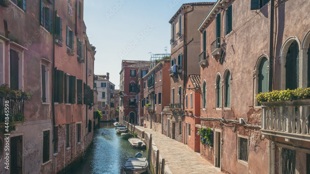 Canal between Venetian houses in Venice, Italy