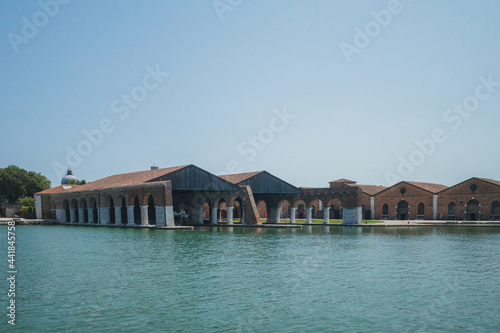 Buildings by water of Arsenal of Venice, Italy © Mark Zhu