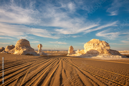 Massive chalk rock formations under the blue sky in White Desert, Farafra, Egypt