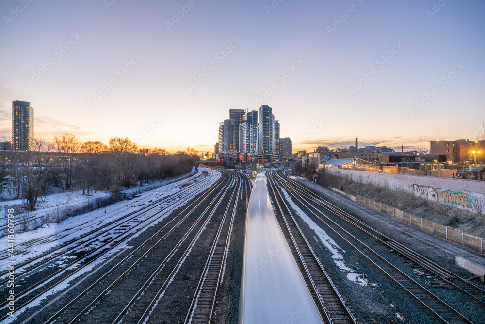 The commenter Go train leaving Liberty Village at Sunset. The commenter Go train leaving Liberty Village at Sunset.