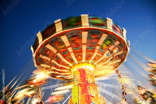 Thailand, Bangkok, Low angle view of spinning carousel photo