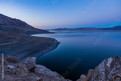 USA, Nevada, Hawthorne, Calm Walker Lake at dusk photo