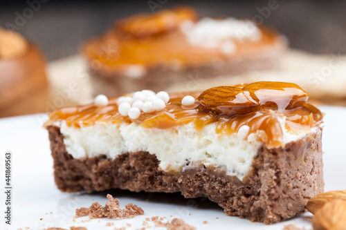 tartlet with milk cheese filling and lots of salted caramel with nuts