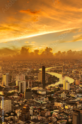 Golden Sunset Bangkok city of cityscape skyline with skyscraper building background in Central business district Bangkok  Thailand