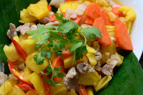Stir Fried Sweet and sour sauce with Pineapple and Pork.