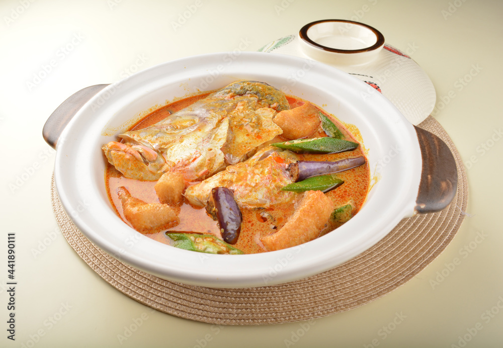 chef cook home style nyonya spicy curry grouper fish head with vegetables in big clay pot asian Chinese banquet halal seafood steamboat cafe restaurant menu chef cook home style nyonya spicy curry grouper fish head with vegetables in big clay pot asian Chinese banquet halal seafood steamboat cafe restaurant menu