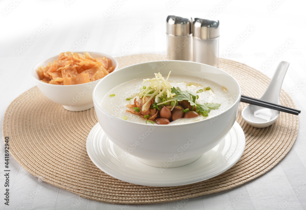 chef boiled Hong Kong teochew congee porridge with peanut, onion and cracker healthy halal vegan menu chef boiled Hong Kong teochew congee porridge with peanut, onion and cracker healthy halal vegan menu