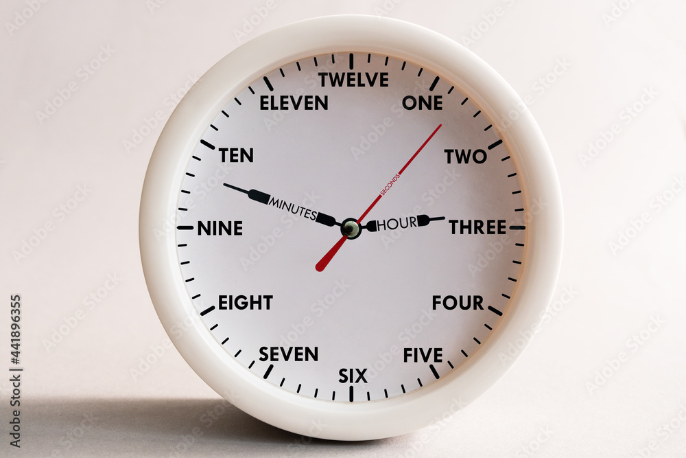 Hour dial with numbers spelled out in words for teaching children to count, language and time orientation by the clock. Spelled out the name of the arrows. Hour dial with numbers spelled out in words for teaching children to count, language and time orientation by the clock. Spelled out the name of the arrows.