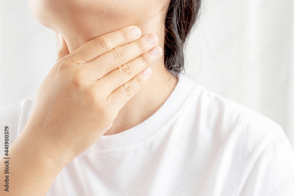 A woman has a cough, cold, sore throat, phlegm.
