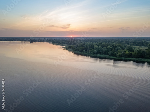 Sunrise over the wide river Dnieper. Aerial drone view. © Sergey