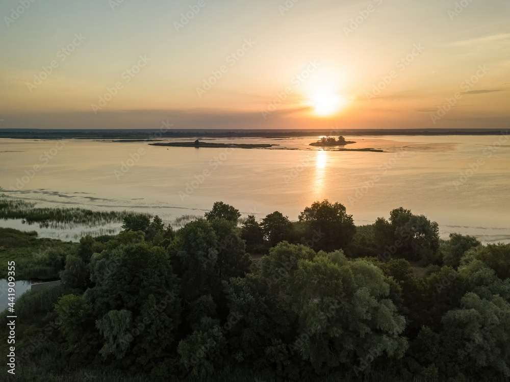 Sunrise over the wide river Dnieper. Aerial drone view. Sunrise over the wide river Dnieper. Aerial drone view.