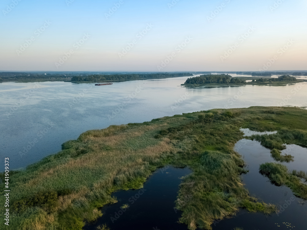 Sunrise over the wide river Dnieper. Aerial drone view.