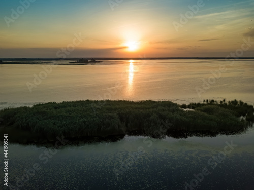 Sunrise over the wide river Dnieper. Aerial drone view.