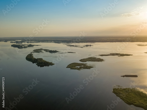 Sunrise over the wide river Dnieper. Aerial drone view.