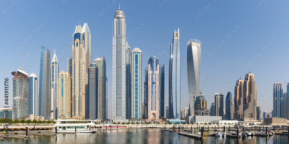 Dubai Marina and Harbour skyline architecture travel in United Arab Emirates water reflection panorama