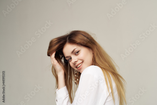 pretty red-haired woman decoration white shirt fashion posing