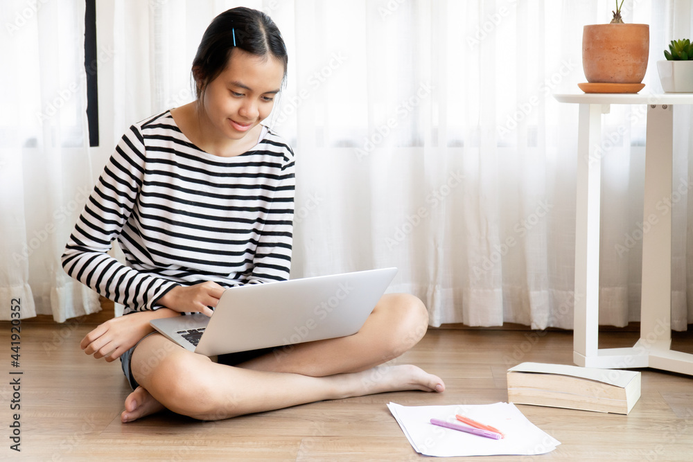 Girl wearing head set and studying online at home during home quarantine. Girl wearing head set and studying online at home during home quarantine.